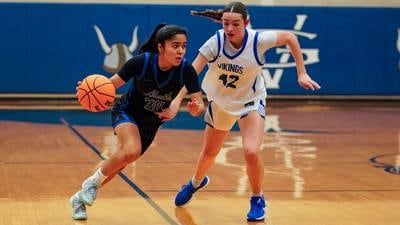Photos: St. Charles North vs. Geneva girls basketball
