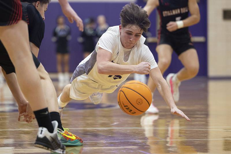 Dixon’s Jimi Gosinski dives for a loose ball against Stillman Valley Friday, Jan. 9, 2026.