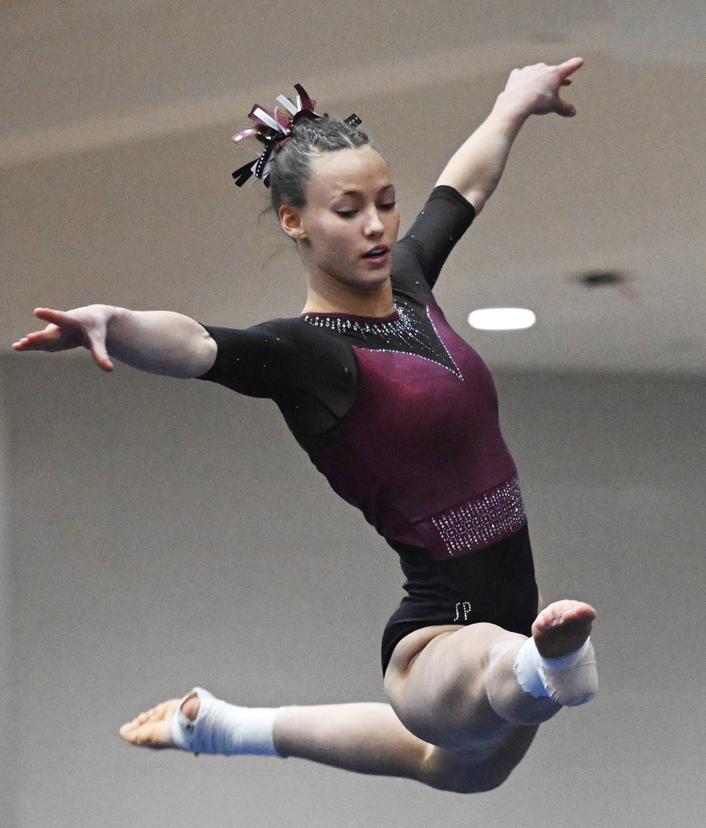 Nora Terhaar of Prairie Ridge competes on floor exercise during the girls state gymnastics meet at Palatine High School on Saturday, Feb. 21, 2026.