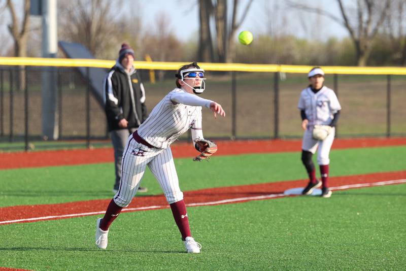 Kankakee's Adleigh Cunningham throws to first base during the Kays 20-11 loss to Crete-Monee on Tuesday, April 7, 2026.