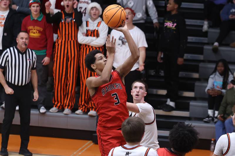 Bolingbrook’s Davion Thompson takes a shot against Minooka on Tuesday, Dec. 17, 2024 in Minooka.