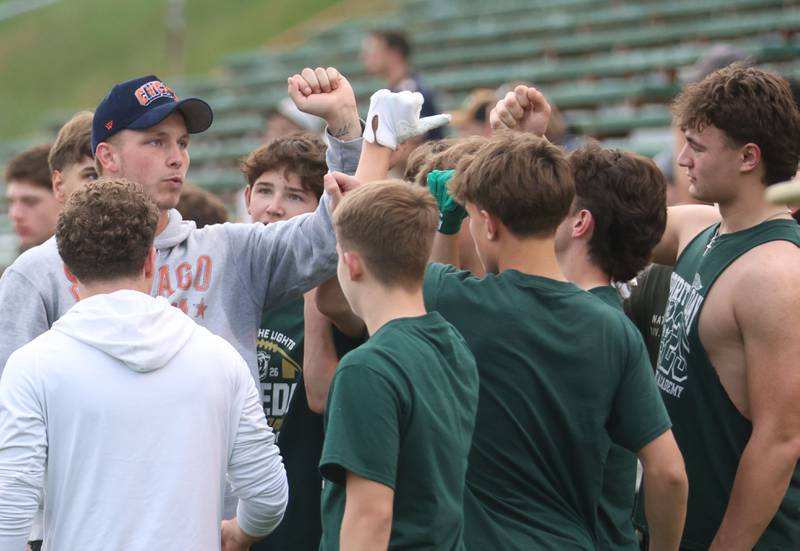 Chicago Bears quarterback Tyson Bagent breaks a huddle with high school students during the Tyson Bagent Offensive Skills Camp on Saturday, May 23, 2026 at St Bede Academy.