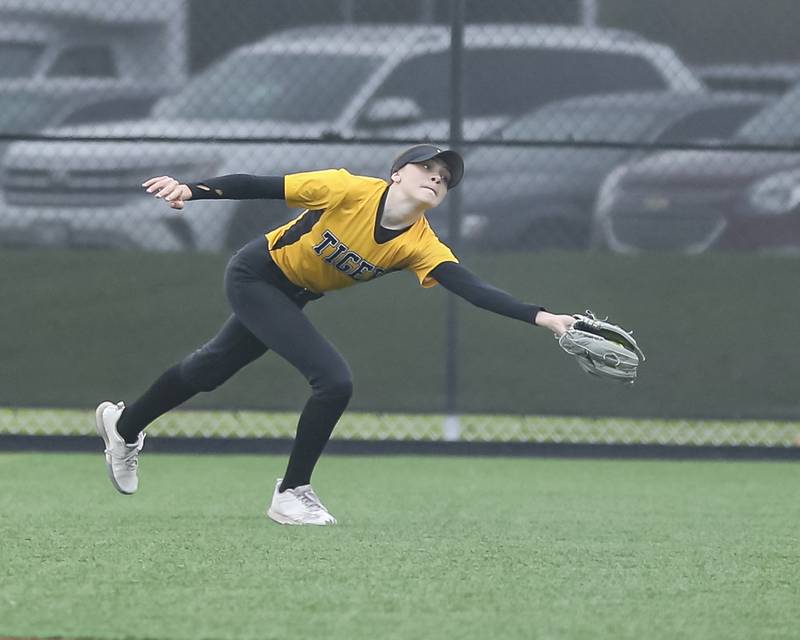 Joliet West's Caitlin Jadron (11) makes a running catch during softball game between Joliet West at Yorkville on Wednesday, April 30, 2025 in Yorkville.