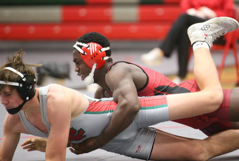 L-P's Zach Pocivasek wrestles Streator's Jordan Lukes during a meet on Wednesday, Dec. 13, 2023 in Sellett Gymnasium at L-P High School.