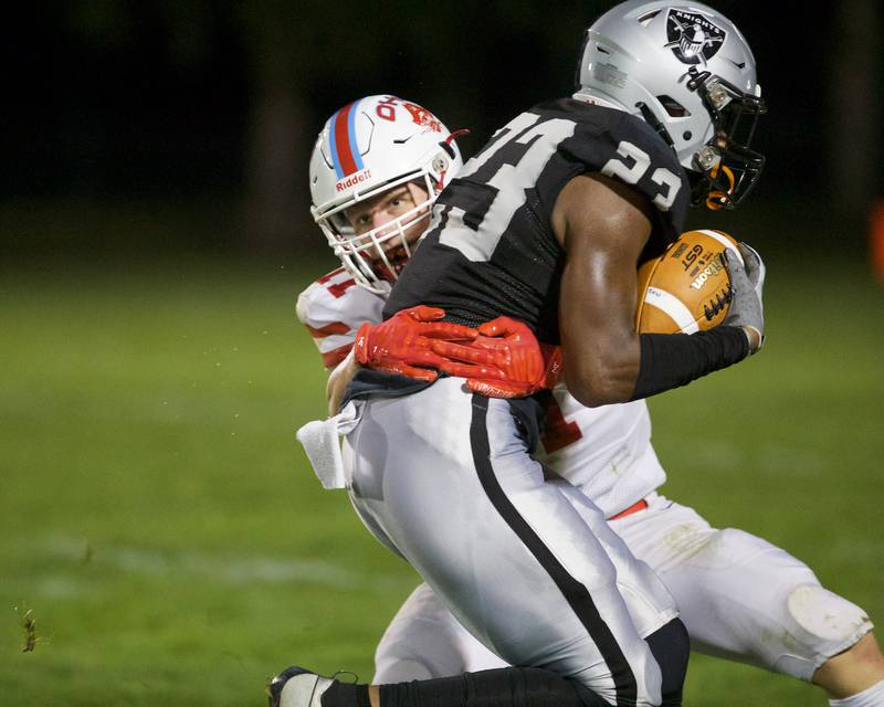Ottawa's Weston Averkamp tackles Kaneland's Aric Johnson on Friday, Sept. 22, 2023 in Maple Park.