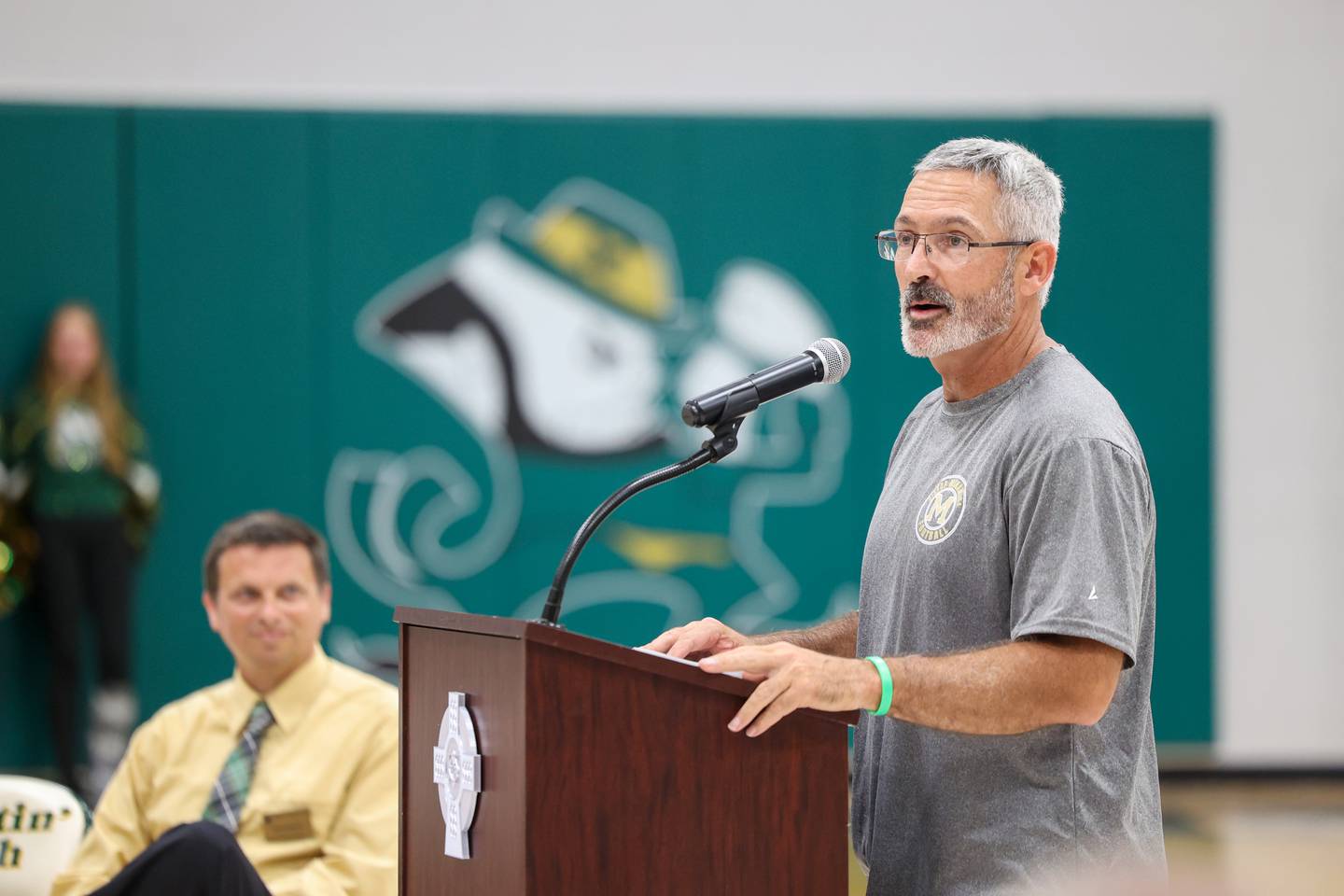 Bishop McNamara's new head football coach Greg Youngblood speaks during the ribbon-cutting ceremony for the new Rich Zinanni Athletic Complex on Thursday, Aug. 21, 2025.