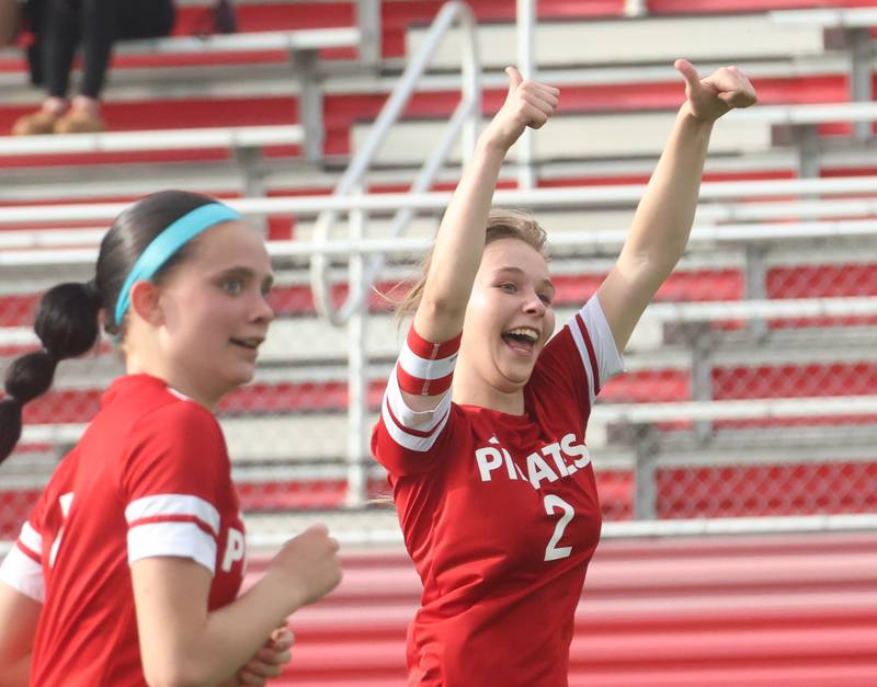 Ottawa's Chloe Carmona reacts with teammate Georgia Kirkpatrick after scoring a goal against L-P on Monday, April 13, 2026 on King Field at Ottawa High School.
