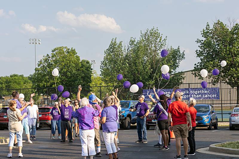 Cancer survivors, representing 284 years of survival, release balloons following their lap during Relay for Life of Whiteside County’s event Saturday, June 3, 2023.