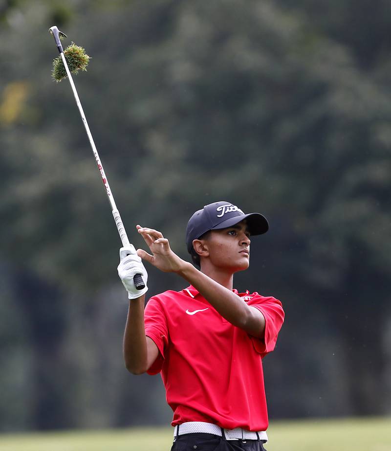 Huntley’s Taig Bhathal watches his fairway shot on the seventh hole during the Fox Valley Conference Boys Golf Tournament Thursday, Sept. 21, 2023, at McHenry Country Club in McHenry.