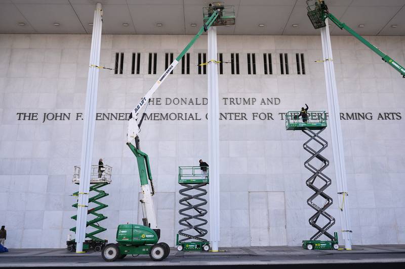 New signage, The Donald J. Trump and The John F. Kennedy Memorial Center For The Performing Arts, is unveiled on the Kennedy Center, Friday, Dec. 19, 2025, in Washington. (AP Photo/Jacquelyn Martin)