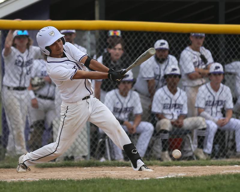 Plano's Jose Barraza (3) hits a bouncer during baseball game between Sandwich at Plano.  May 8, 2024