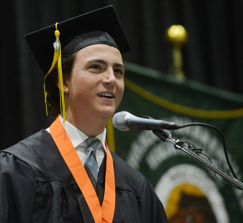 Joe Lewnard/jlewnard@dailyherald.com
David Allgood speaks during the Wheaton Warrenville South High School graduation, held at the College of Dupage in Glen Ellyn Saturday.