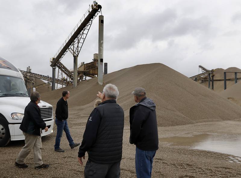 Jack Pease explains the Super Aggregates Marengo Lakes mine during the McHenry County Sand and Gravel Mining Tour on Thursday, Oct. 12, 2023. The tour brought McHenry County board members, township and village officials on a four hour trip to visit operating mines on Route 23 in Marengo and to former sites now reclaimed for housing, recreation in Algonquin and Cary.