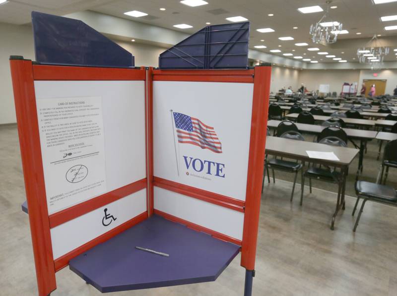 An empty voter booth is vacant at the Knights of Columbus Hall during the Primary Election on Tuesday, June 28, 2022 in Ottawa.
