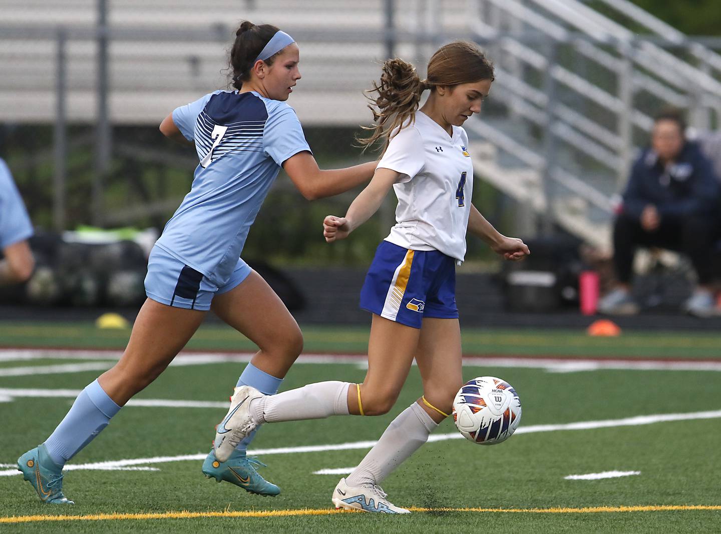Johnsburg's Ava Jablonski tries to control the ball as she is defended by Willows’ Erin Mongoven during a IHSA Division 1 Richmond-Burton Sectional semifinal soccer match Tuesday, May 16, 2023, at Richmond-Burton High School.