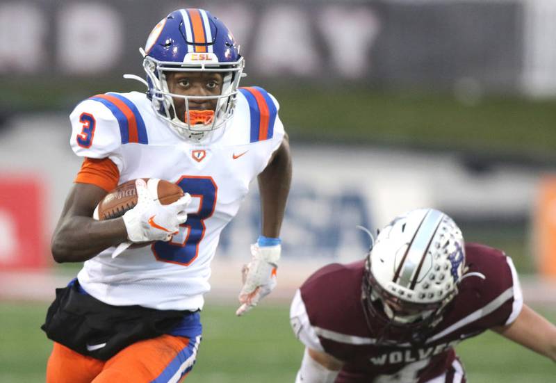 East St. Louis receiver Keantez Lewis gets behind the Prairie Ridge defense for a big gain during their Class 6A state football championship game Saturday in Huskie Stadium at Northern Illinois University.