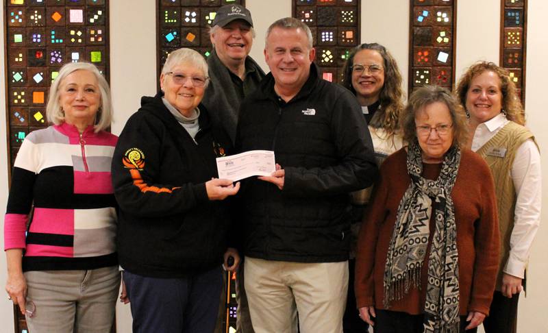 The Unitarian Universalist Congregation of DeKalb receiving a $25,000 City of DeKalb’s Architectural Improvement Program grant