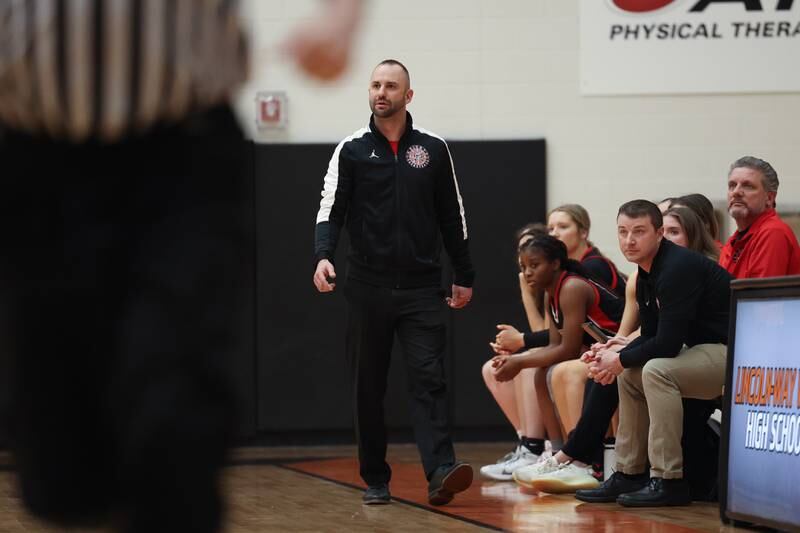 Lincoln-Way Central head coach Dave Campanile walks the sideline against Lincoln-Way West on Tuesday, February 7th..