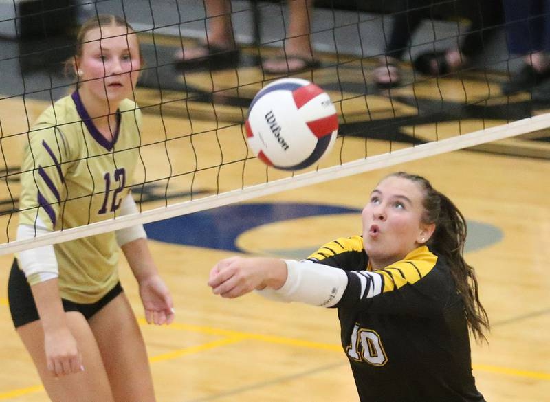 Putnam County's Myah Richardson keeps the ball in the air as Serena's Anna Hjerpe watches on the opposite side of the net on Monday, Sept. 22, 2025 at Putnam County High School.