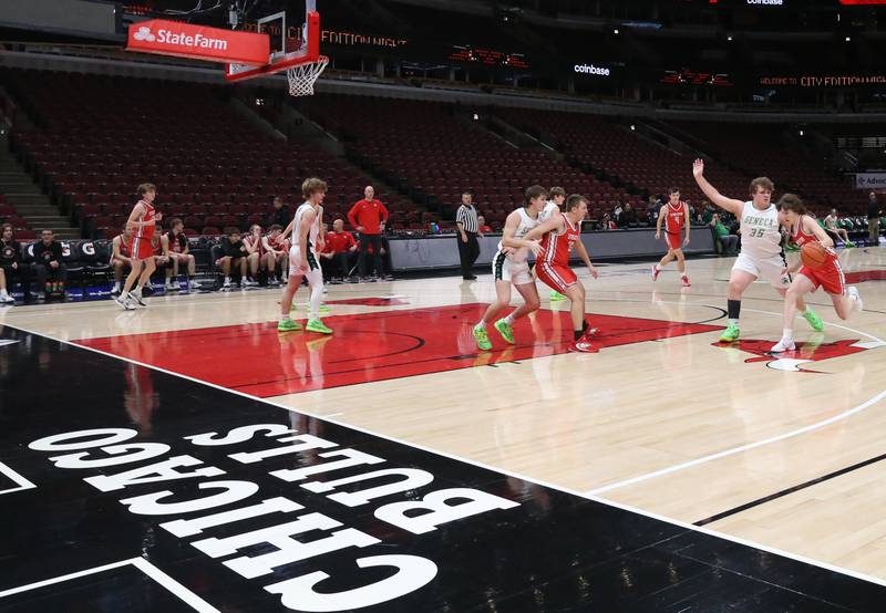 Seneca and Streator junior varsity players play a ten-minute game after the varsity game on Tuesday, Dec. 21, 2023 at the United Center in Chicago.