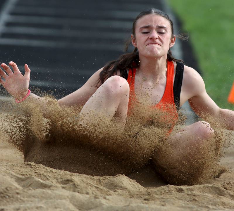 Sandwich’s Addyson Cline competes in the long jump during KRC Conference Track Meet action at Marengo High School in Marengo on Tuesday, May 6, 2025.