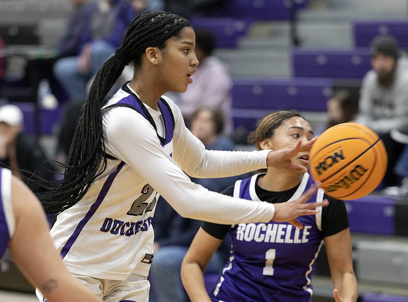 Dixon's Ahmyrie McGowan makes a pass against Rochelle Thursday, Dec. 26, 2024, during the Dixon Girl’s KSB Holiday Basketball Tournament.