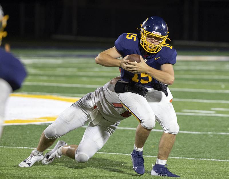 Sterling’s  Drew Nettleton is tackled against United Township Friday, Sept. 13, 2024, at Sterling High School.