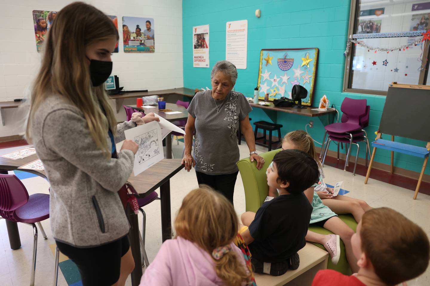 Volunteer Carmen Janega helps as an assistant with the summer camp at the C.W. Avery YMCA in Plainfield. Wednesday, July 20, 2022 in Plainfield.