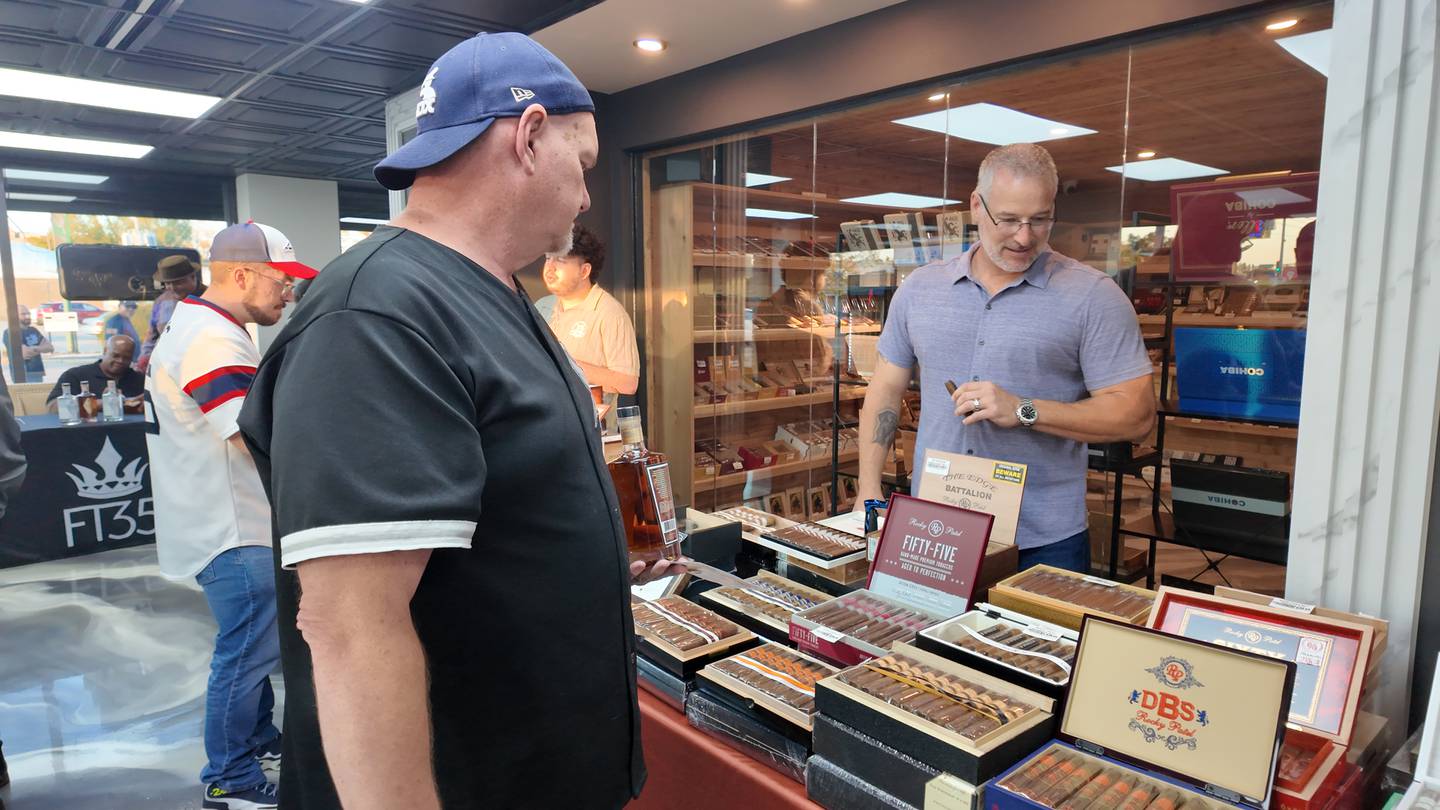 The grand opening at Goodfellas Cigar Lounge in Joliet included vendors promoting different cigar brands and prizes, raffles and giveaways from the cigar companies.