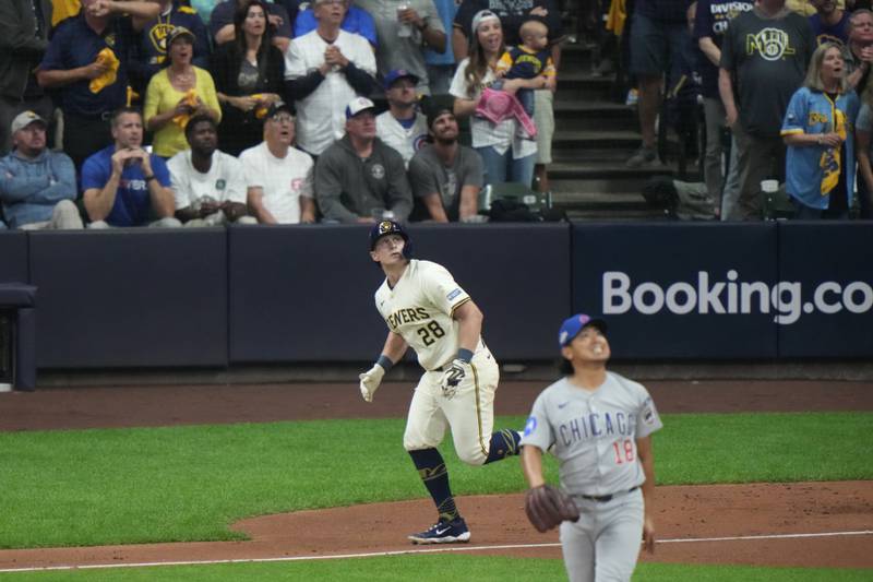 Milwaukee Brewers' Andrew Vaughn (28) runs the bases as Chicago Cubs starting pitcher Shota Imanaga (18) reacts after hitting a 3-run home run during the first inning of Game 2 of baseball's National League Division Series Monday, Oct. 6, 2025, in Milwaukee. (AP Photo/Morry Gash)