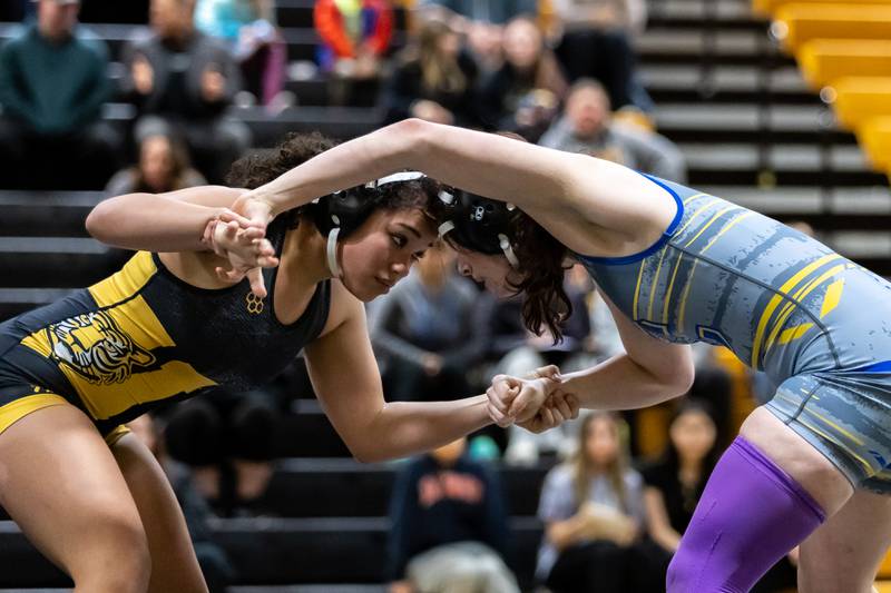 Joliet West’s Kaylah Harris and Joliet Central’s Emma Guethle compete in the 140 pound match at Joliet West on Jan. 12, 2026.