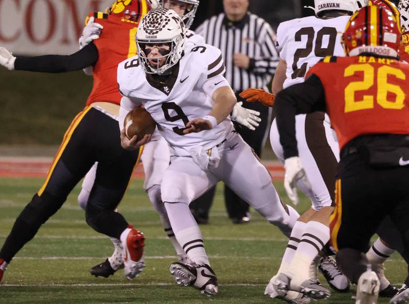 Mt. Carmel's Jack Elliott gets through a hole in the Batavia line during their Class 8A state championship game Saturday, Nov. 30, 2024, in Hancock Stadium at Illinois State University in Normal.