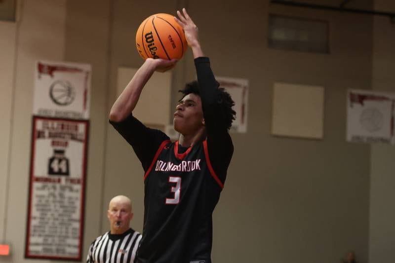 Bolingbrook’s TJ Williams puts up the outside shot against Benet in the Class 4A Bolingbrook Sectional championship game on Friday, March 6, 2026 in Bolingbrook.