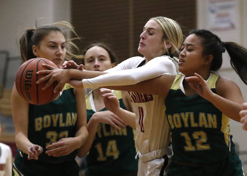 Huntley's Anna Campanelli, second from right, tries to drive to the basket against Boylan's Lily Esparza, left to right, Mary Rose, and Alayna Petalber during a Dundee-Crown Thanksgiving Girls Basketball Tournament basketball game Wednesday, Nov.. 16, 2022, between Huntley and Boylan at Huntley High School.