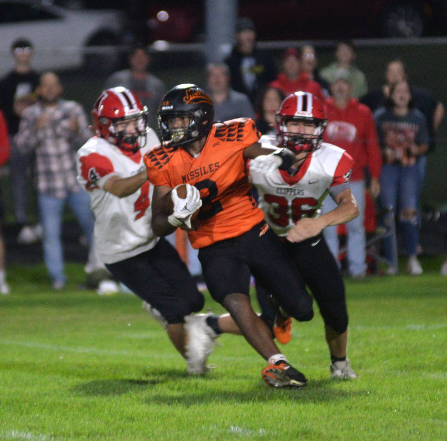 Milledgeville's Micah Toms-Snith (2) runs for a gain against Amboy on Friday, Sept. 29, 2023 action at Milledgeville High School.