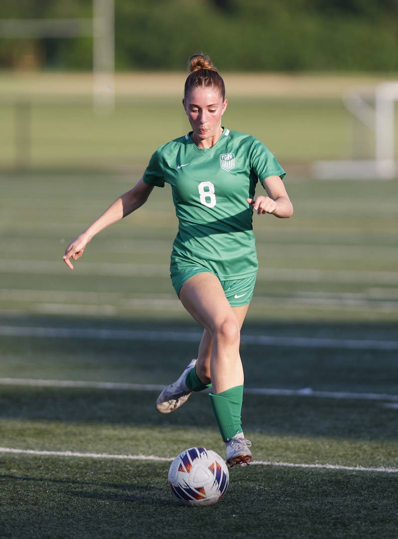 York's Maggie Quinn (8) tracks down the ball during the Class 3A Morton regional girls soccer final between Downers Grove South and York in Berwyn on Friday, May 17, 2024.