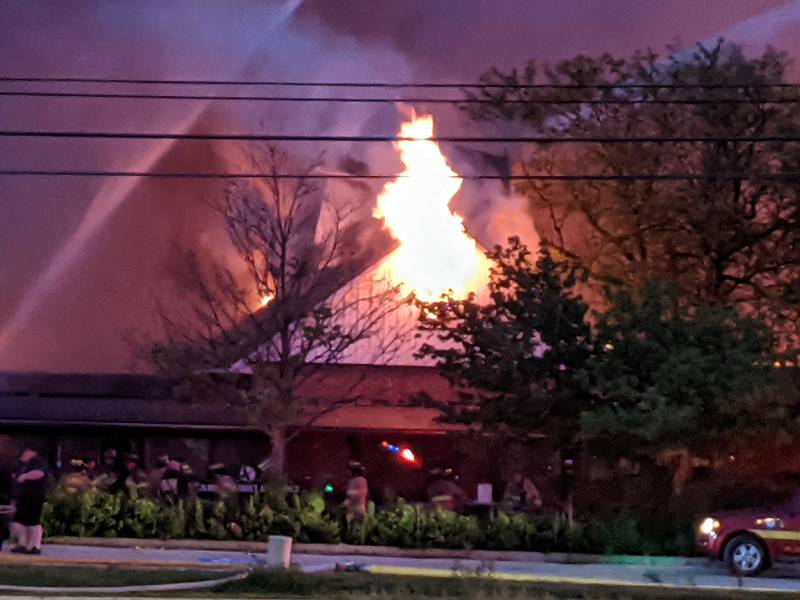 Fire crews continued to battle a massive fire at the former Pheasant Run Resort property in St. Charles late into Saturday night. Several buildings on the property appeared to be involved in the fire.
