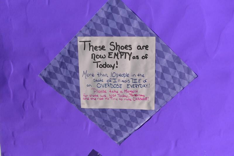 Ten pairs of empty shoes were displayed at the Sauk Valley Voices of Recovery Overdose Awareness event in Dixon on Thursday, Aug. 31, 2023 to show that at least 10 people are lost to overdose every day in Illinois.
