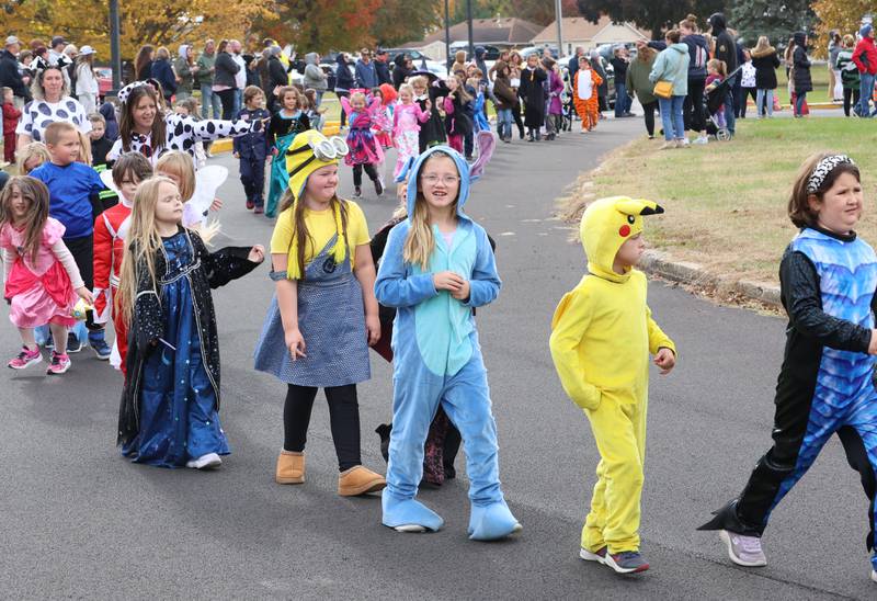 Students from Jefferson Elementary walk around the school during a Halloween parade on Friday, Oct. 31, 2025 in Princeton.