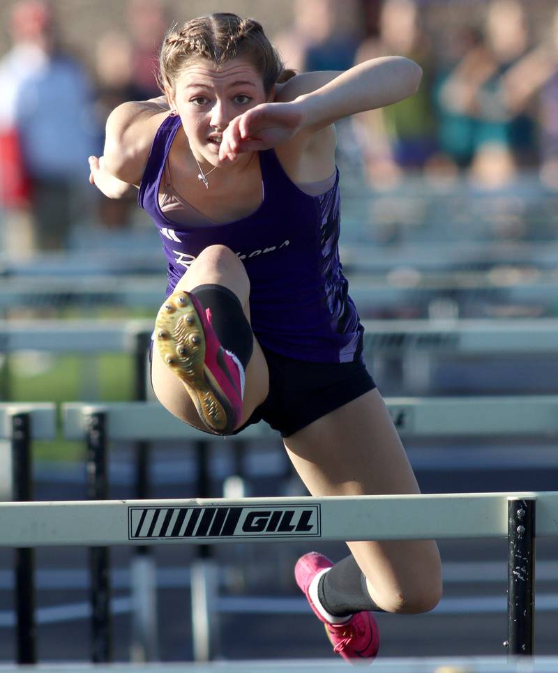 Plano’s Kaylee Klatt competes in the 110-meter hurdles during the Kishwaukee River Conference Girls Conference Championships track meet at Harvard High School Tuesday.