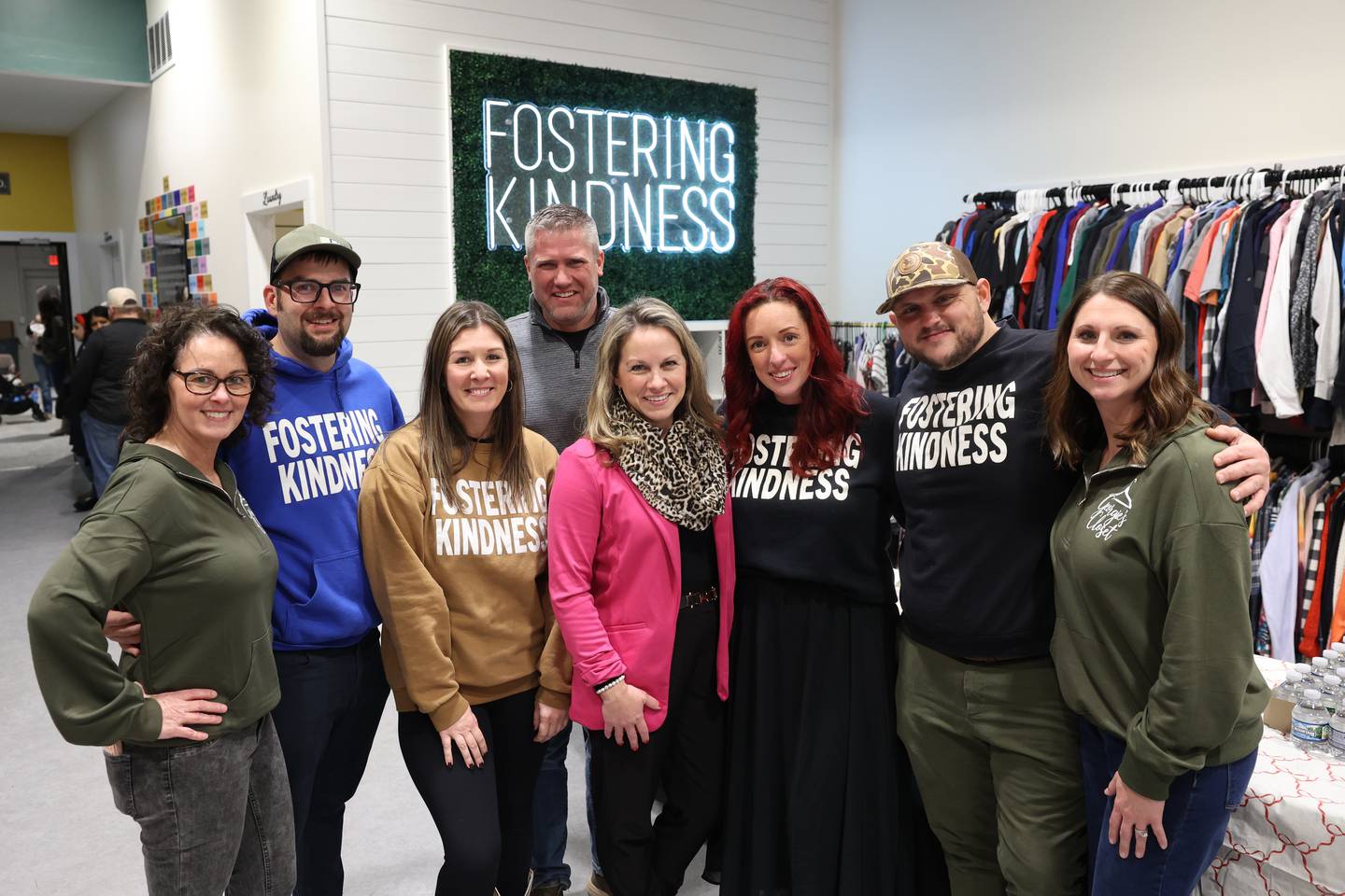 Volunteers and board members of Georgie's Closet pose for a photo during the not-for-profit's new location grand opening on Monday, Dec. 1, 2025. From left: Becky Runner, Steven Brooks and Chief Operating Officer Allie Brooks, Adam and Gina Baumgartner, President Rachel Langlois and husband Andrew Langlois, and treasurer Ashley Sommer.