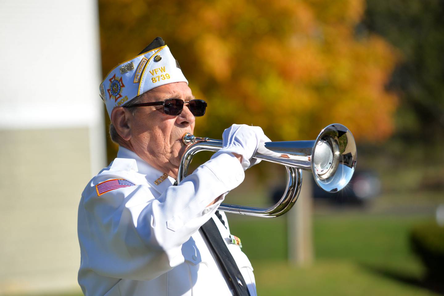 Oregon veteran Lee Ossman plays taps at the Oregon VFW's Veteran Days ceremony on Monday, Nov. 11, 2024 in Oregon. The event was hosted by the VFW Post and the American Legion 97.