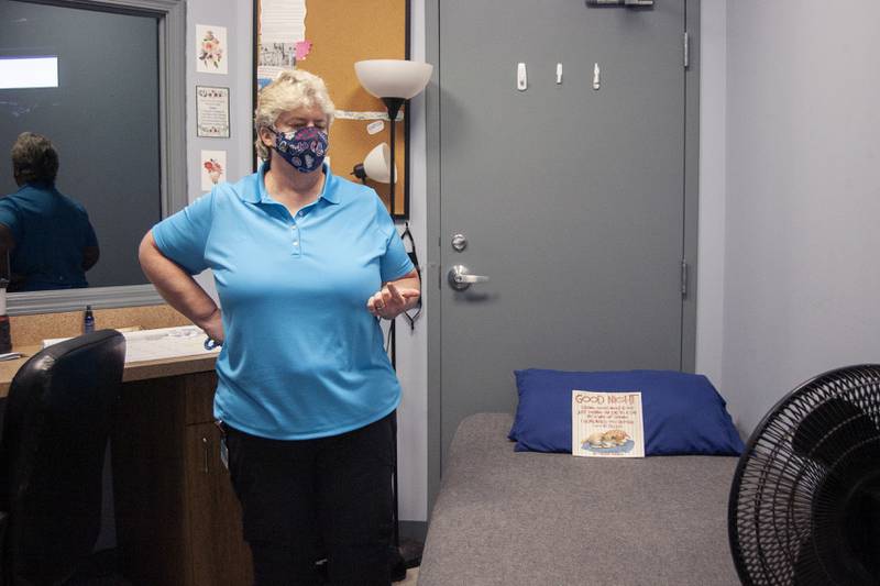 Carrie Freund, the director of homeless services for the Pioneer Center, gives the Northwest Herald a tour on Monday, Oct. 18, 2021, of the new McHenry PADS shelter.