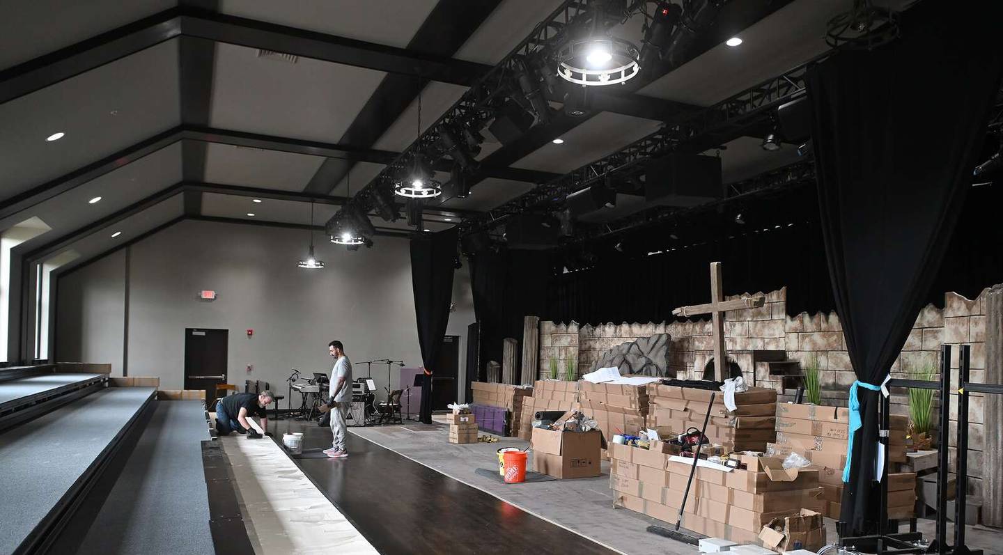 Work to put in new seats on retractable risers continued Wednesday at The Lodge Performing Arts Center in Elgin.