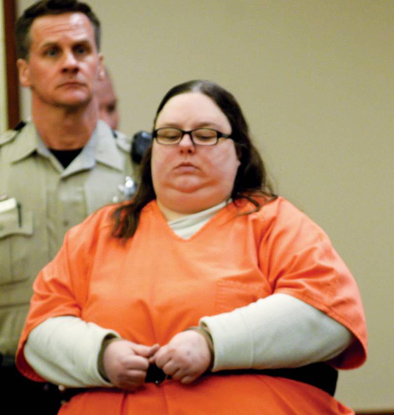 Sarah Safranek is escorted into an Ogle County courtroom on Tuesday, March 12, 2024.