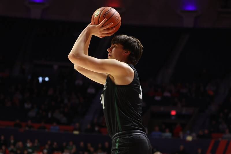 Glenbard West’s Braden Huff launches a three pointer against Bolingbrook in the Class 4A semifinal at State Farm Center in Champaign. Friday, Mar. 11, 2022, in Champaign.