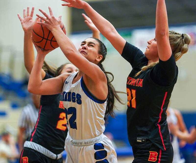 Geneva’s Leah Palmer (22) drives to the hoop against Batavia during a basketball game at Geneva High School on Friday, Dec 15, 2023.