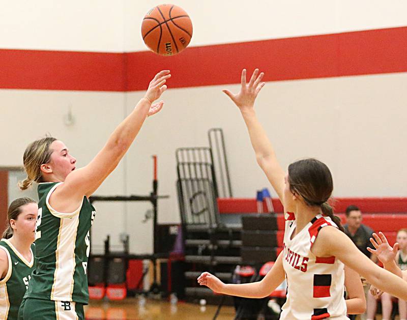 St. Bede's Ella Hermes (42) shoots a jump shot over Hall's Promise Giacometti (5) on Monday, Nov. 28, 2022 at Hall High School in Spring Valley.