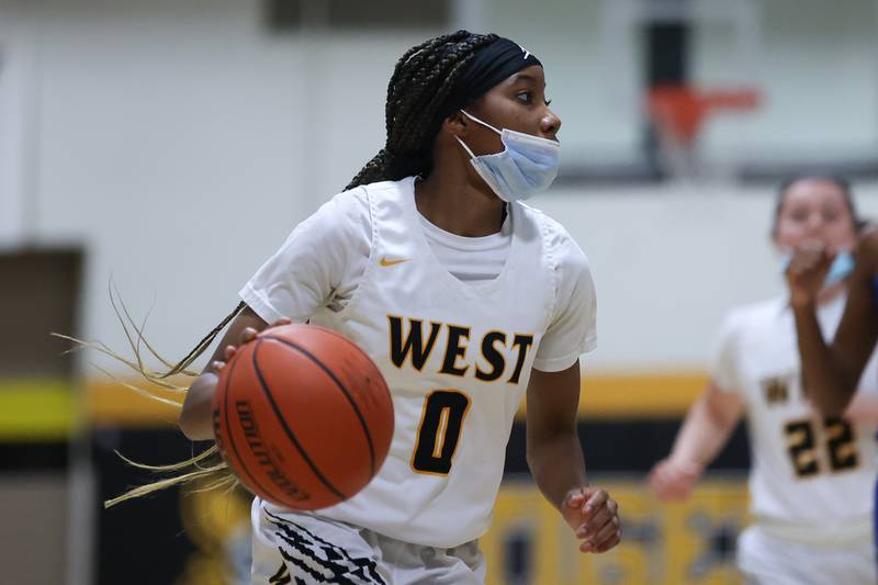 Joliet West’s Lisa Thompson looks to make a play against Joliet Central in the Class 4A Moline Regional semifinal. Tuesday, Feb. 15, 2022, in Joliet.