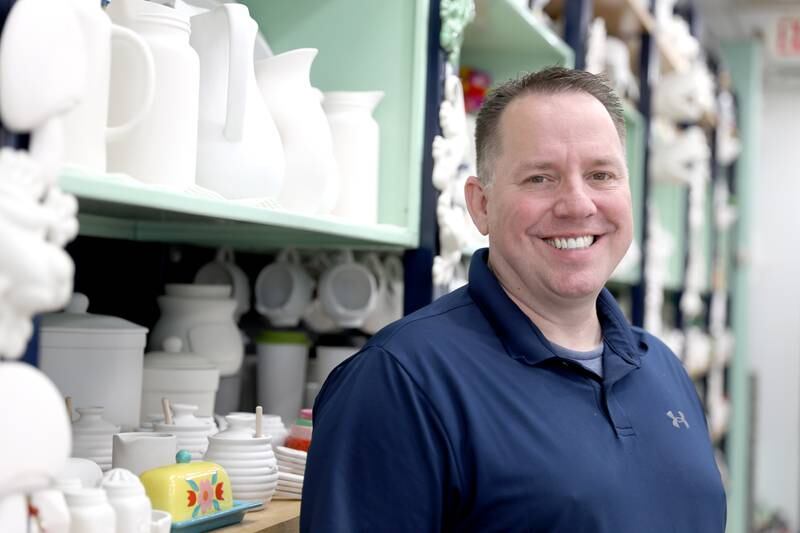 U.S. Navy veteran Jason Stucky now owns the Color Me Mine pottery studio in Geneva.